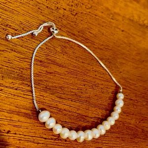 Pearl and silver tone bracelet
